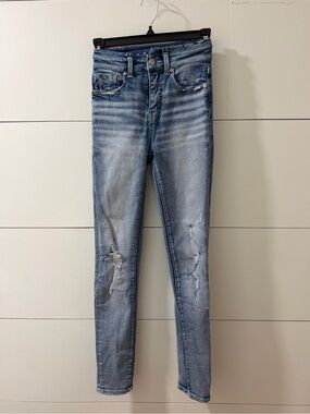 Buckle High-Rise Light Blue Distressed Skinny Jeans